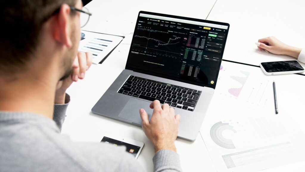 A man looking at his financial statements