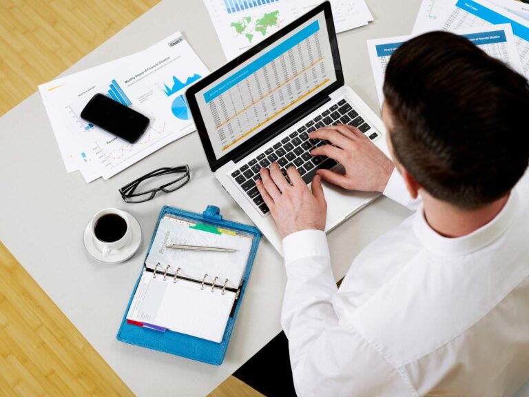a man doing accounting and financial statements